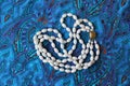 Beads of blue and white stone Royalty Free Stock Photo