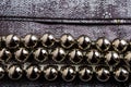 Beads on the edge of the curtain. Interior decor. Background with selective focus