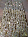 Beads on gold fabric Royalty Free Stock Photo