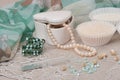 Beads Jewelry On Natural Linen Background. Hand