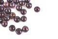 Beads made of natural garnet agate on a white background are isolated Royalty Free Stock Photo