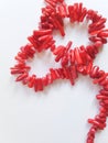 A beads from pieces of coral on a white background