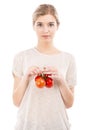Beaitiful woman holding red tomatos Royalty Free Stock Photo