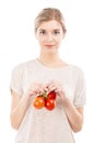 Beaitiful woman holding red tomatos Royalty Free Stock Photo