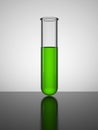 Beaker with green liquid. Test tube.