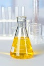 Beaker with Yellow Colorant Royalty Free Stock Photo