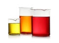 Beakers with color liquid isolated. Solution chemistry Royalty Free Stock Photo