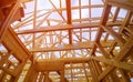 Beam close-up building with under construction wooden house with timber framing