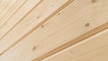 Beam or imitation texture. Wood texture background. Profiled glued timber. Decorative cladding board with beveled bevels and a