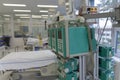 Beam with infusion pumps and syringe pumps, on background beds in ICU in hospital, a place where can be  treated patients with Royalty Free Stock Photo