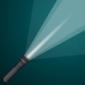 Beam of light from a flashlight. Black and metal. Royalty Free Stock Photo