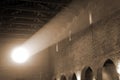 Beam of light from rose window that illuminates the interior of Royalty Free Stock Photo