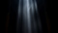 A beam of light shines through darkness, creating a sense of hope and inspiration Royalty Free Stock Photo