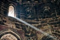 Beam of light from window of ancient indian tomb Bada Gumbad in New Delhi, India, white ray of light