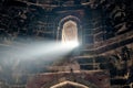 Beam of light from window of ancient indian tomb Bada Gumbad in New Delhi, India, white ray of light