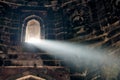 Beam of light from window of ancient indian tomb Bada Gumbad in New Delhi, India, white ray of light