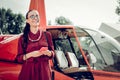 Beaming woman feeling excited before romantic date in the sky