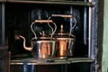 Beamish living history museum. Durham, UK. August 2023. Building interior. Copper kettles. Royalty Free Stock Photo