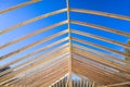 Beams roof construction are taken from the details wooden frame at construction of a new house Royalty Free Stock Photo