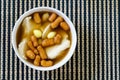 Bean junket eaten hot with gingered sirup, Ginkgo nuts, and mini Royalty Free Stock Photo