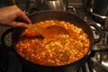 Bean meal with meat in a cast iron pot