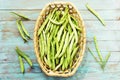 Bean pods on the dark table.