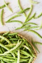 Bean pods in wicker baskets.