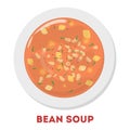 Bean soup in a white plate. Tasty meal in a bowl