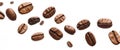 Beans of coffee flying against a white background. coffee grains in the air. Royalty Free Stock Photo