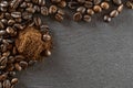 Beans for dark caffeine espresso on black food background. For cup of coffee drink in cafe. Brown roasted coffee seeds Royalty Free Stock Photo