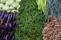 Beans, eggplants and cabbage piles on farm market table. Vegetables closeup photo. Organic farm market Royalty Free Stock Photo