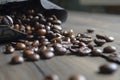 Beans poured out of the coffee bag. Coffee beans on the table next to the package. Lots of coffee beans. New packaging Royalty Free Stock Photo