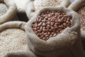 Beans, rice, lentils, oats, wheat, and barley in jute sack