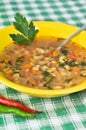 Beans soup with parsley leaf and peppers