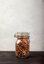 Beans, white and red, lentils green and red, peas in a closed glass jar on a black table on a white background. opy spaes Royalty Free Stock Photo