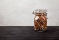 Beans, white and red, lentils green and red, peas in a glass jar on a black table on a white background. Copy spaes Royalty Free Stock Photo