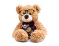 Brown doctor teddybear with eye glasses and medical stethoscope isolated on white Royalty Free Stock Photo