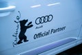 Bear, Berlinale symbol, and Audi logo on a car