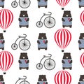 Bear with bicycle and hot air balloon seamless pattern.