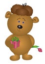 Bear in a cap gives a flower