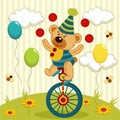 Bear clown juggles and rides a unicycle Royalty Free Stock Photo