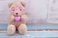 Bear doll holding pink heart shape Royalty Free Stock Photo