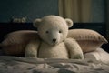 bear doll lying on plush bed, with its head and shoulders propped up by fluffy pillows