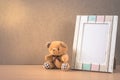 Bear doll with picture frame,vintage color filtered. Royalty Free Stock Photo