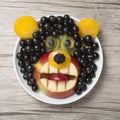 Funny bear made with currant, apple and kiwi Royalty Free Stock Photo