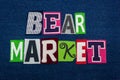 BEAR MARKET text word collage, multi colored fabric on blue denim, falling price and demand concept