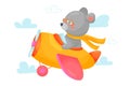 Bear pilot is flying on plane through the clouds. Royalty Free Stock Photo