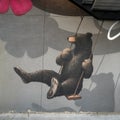 Bear portion of the `Enjoy Local` mural by Jason Jones at the Fayetteville Town Center in Arkansas.