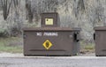 Bear proof trash can on roadside