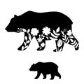 Bear silhouette vector illustration. Floral cutout mammal vector icon.